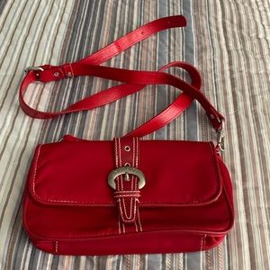 Hadaki red nylon clutch bag.